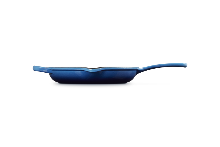 Side view of Le Creuset 23cm Signature Round Skillet in azure blue showing handle and pouring spout.