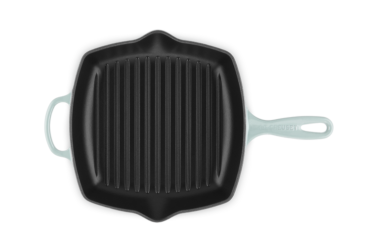 Le Creuset 26cm Square Grillit pan in sea salt color, top-down view showing ridged cooking surface and handles.