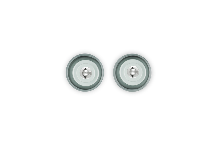 Top view of Le Creuset 330ml stoneware oil and vinegar set in sea salt color with stainless steel caps