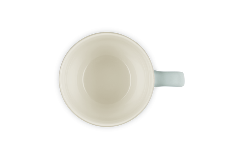 Top-down view of a Le Creuset Grand Mug 400ml in Sea Salt with a cream interior and light blue handle.