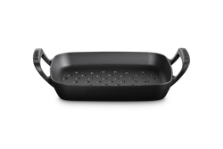 Le Creuset cast iron BBQ square grilling basket with enamel finish, perfect for outdoor cooking – available at Keans