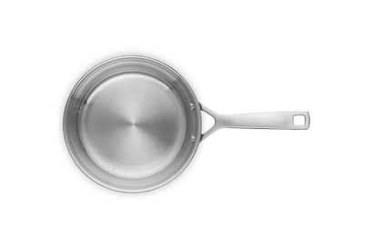 Le Creuset 20cm 3-ply stainless steel frying pan with uncoated interior, top-down view.