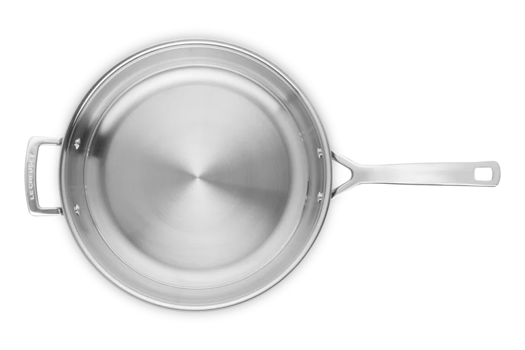 Le Creuset Classic 3-Ply Stainless Steel Frying Pan 30cm shown from top, highlighting smooth cooking surface and handles.