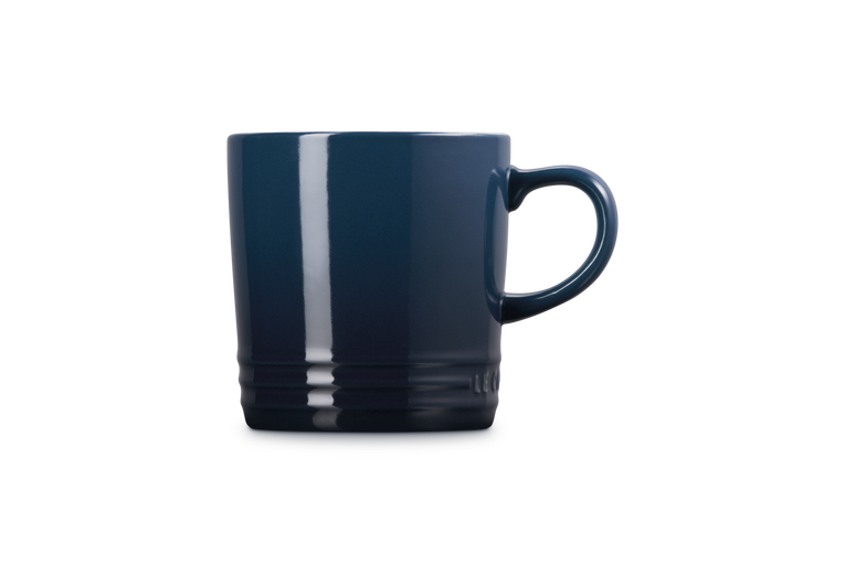Le Creuset London Mug 350ml in deep blue with a rounded handle and subtle base ridges.