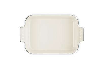 Le Creuset rectangular deep dish 26cm in Nuit color, shown from top view with handles visible.
