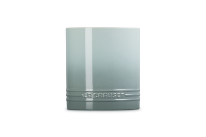 Le Creuset small utensil jar in sea salt color with embossed logo and glossy finish, front view.