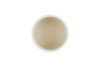 Le Creuset Small Utensil Jar in Sea Salt color, shown from a top-down view with a smooth cream interior.