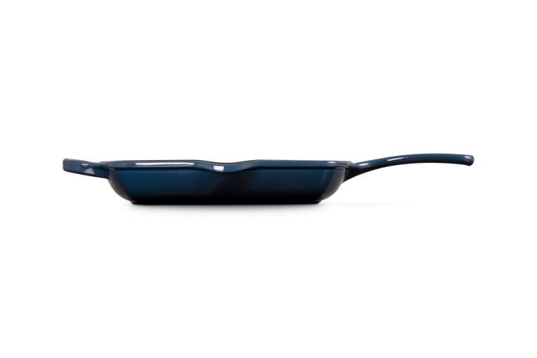 Le Creuset 26cm Square Grillit Nuit cast iron grill pan shown from side with long handle and helper handle.