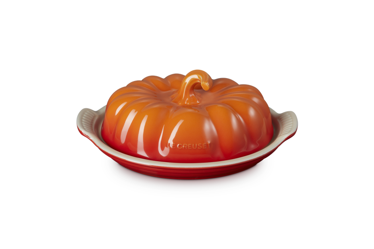 Le Creuset Halloween Pumpkin Butterdish in volcanic orange with a pumpkin-shaped lid and cream base.