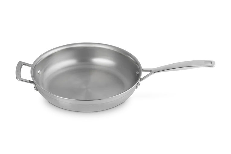 Le Creuset Classic 3-ply stainless steel frying pan, 28cm, shown from a side angle on a white background.