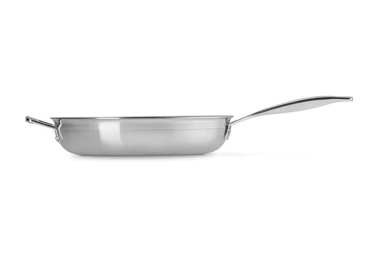 Le Creuset Classic 3-ply stainless steel frying pan, 28cm, side view showing handle and body