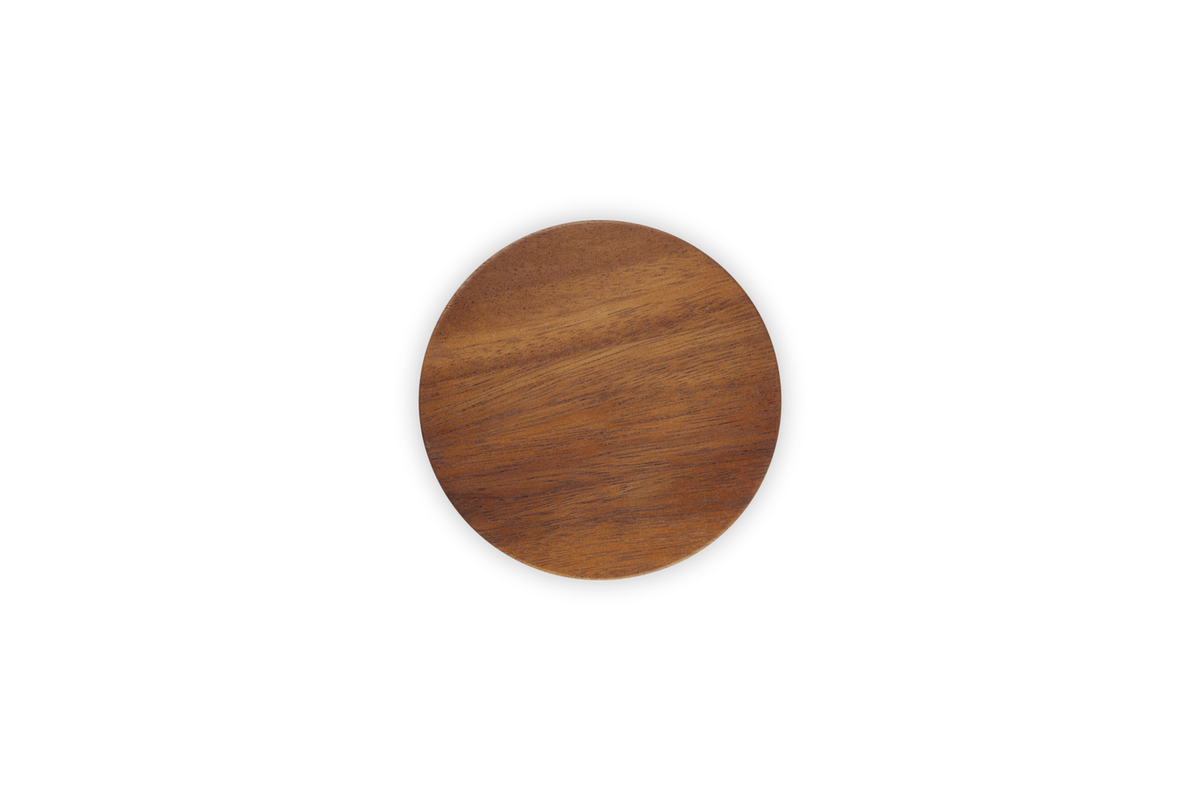 Top view of Le Creuset Stoneware Storage Jar lid in satin black with wooden center.