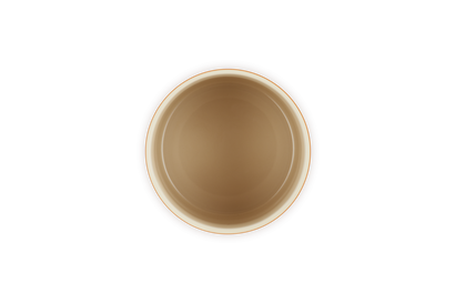 Top-down view of a volcanic-colored Le Creuset small utensil jar showing its smooth interior surface.
