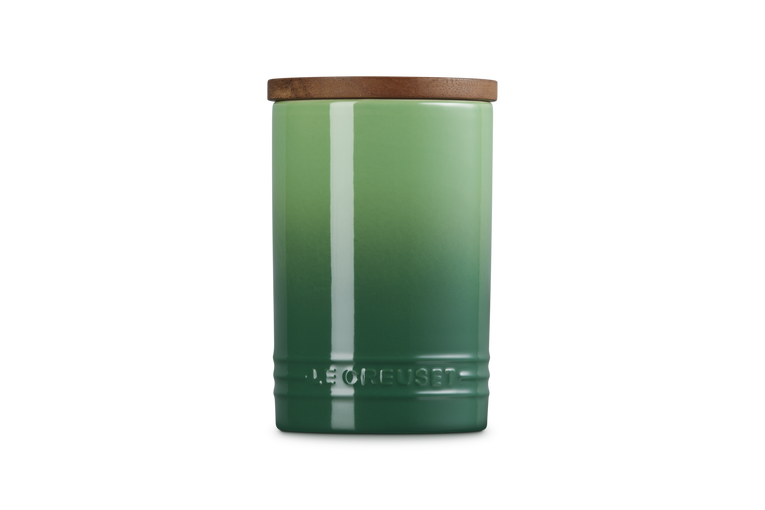 Le Creuset stoneware storage jar in green gradient with bamboo lid, 770ml capacity, front view.
