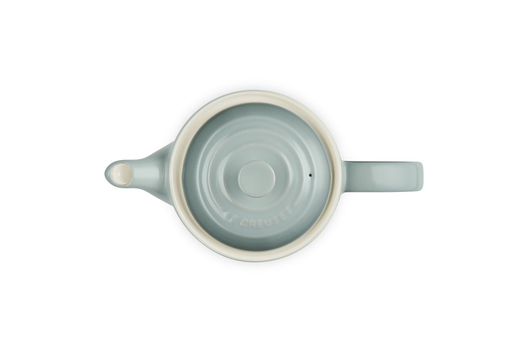 Top view of a sea salt colored Le Creuset 1.3L Grand Teapot showing the lid and handle.
