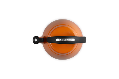 Le Creuset Cloche Kettle 2.1L in volcanic orange, top view showing handle and lid knob.