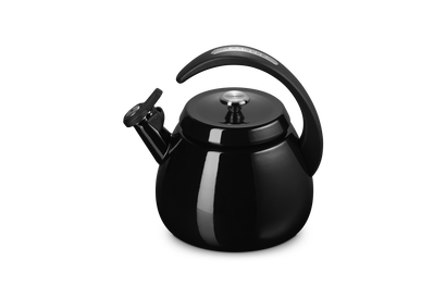 Le Creuset Cloche Kettle 2.1L in black with curved handle and spout cover, shown on white background.