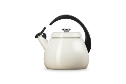 Le Creuset Cloche Kettle 2.1L in meringue color with black handle and whistle spout, front view.
