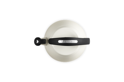 Top view of Le Creuset Cloche Kettle 2.1L in Meringue with black handle and cream interior.