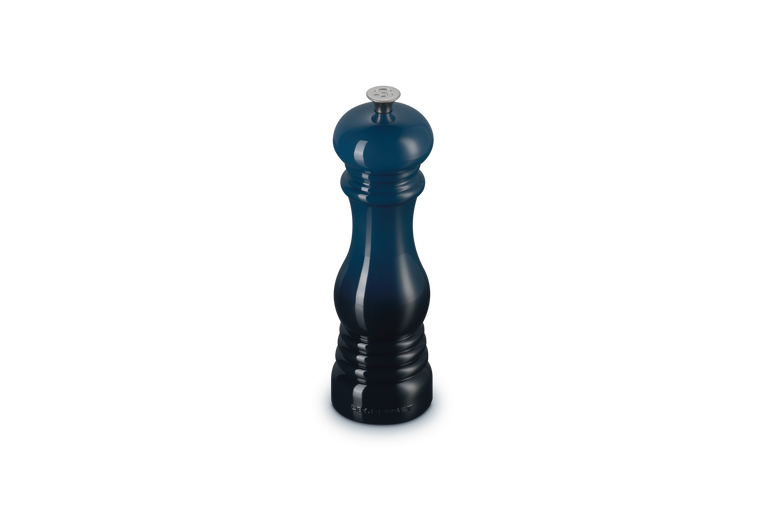 Le Creuset Salt Mill Nuit in glossy dark blue, shown upright with metal top knob.