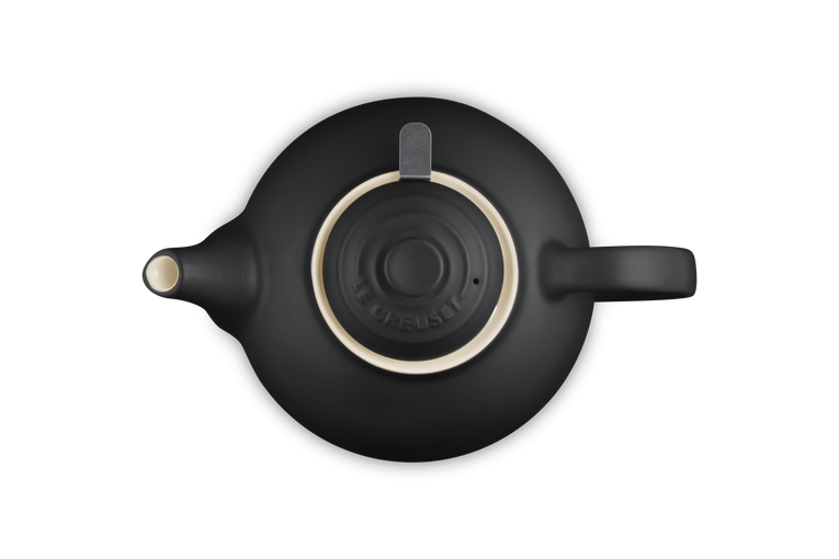Top view of Le Creuset Stoneware Classic Teapot in satin black with lid and infuser handle visible