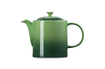 Le Creuset 1.3L Grand Teapot in green gradient with round handle and lid knob, side view on white background.