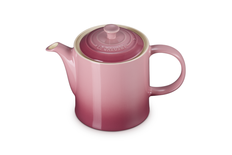 Le Creuset 1.3L Grand Teapot in rose quartz with lid, shown from a front angle on a white background.