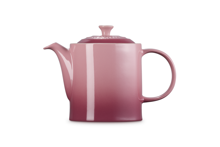 Le Creuset 1.3L Grand Teapot in rose quartz with a smooth gradient finish, side view.