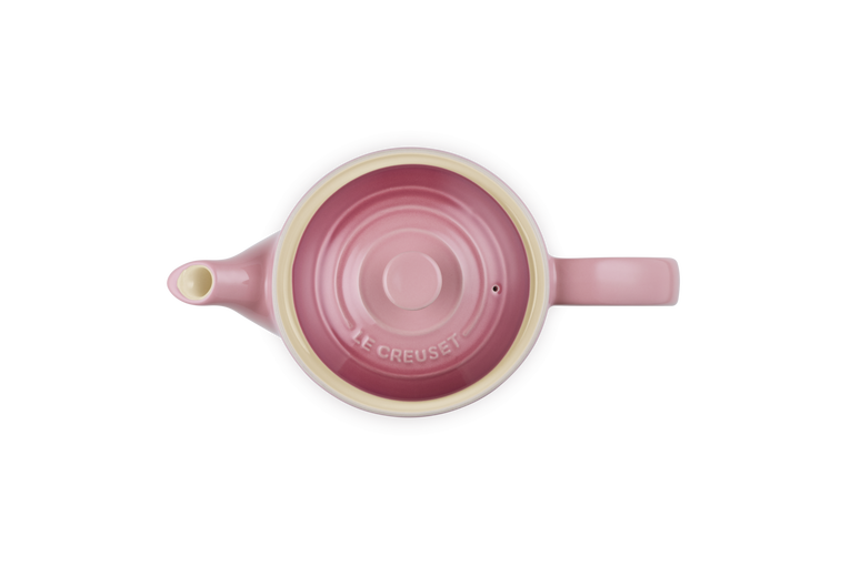 Top view of Le Creuset 1.3L Grand Teapot in rose quartz showing lid, spout, and handle.