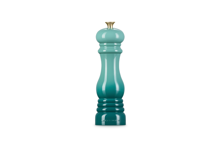 Le Creuset Classic Salt Mill in Blue Riviera with gold-tone top, shown upright on white background.