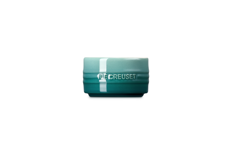 Le Creuset Stackable Ramekin in Blue Riviera, side view showing embossed logo and gradient glaze.