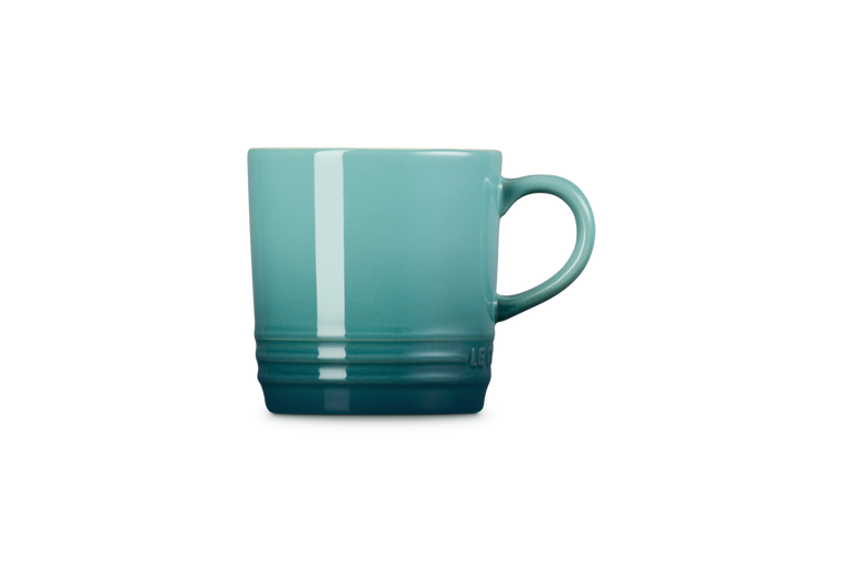 Le Creuset Cappuccino Mug 200ml in Blue Riviera, side view showing gradient color and handle.