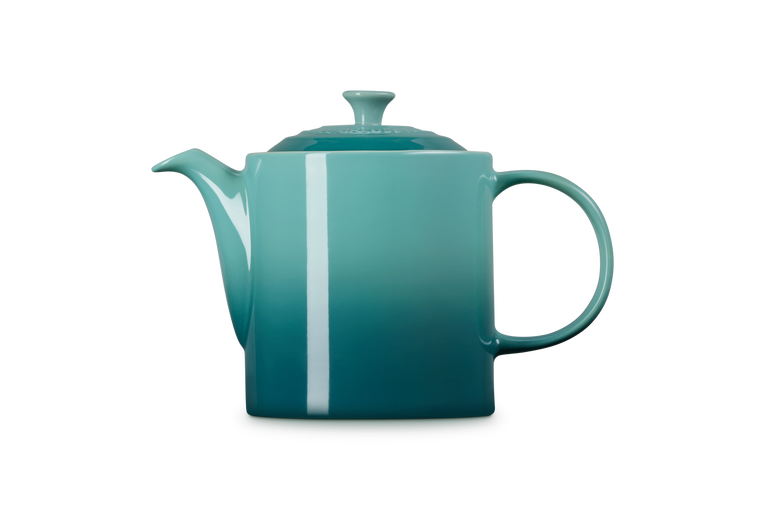 Le Creuset 1.3L Grand Teapot in Blue Riviera with a smooth gradient finish, side view on white background