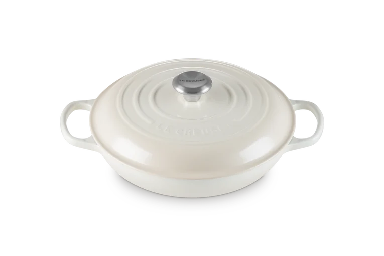 Le Creuset Signature 26cm shallow cast iron casserole in meringue with lid and side handles.