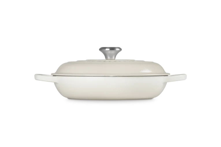 Le Creuset Signature Cast Iron Shallow Casserole 26cm in meringue, side view with lid on