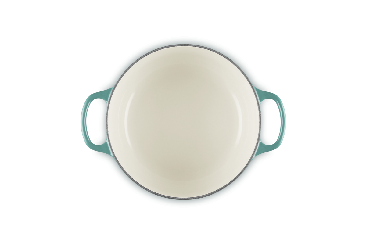 Le Creuset 28cm round casserole in Blue Riviera, top view showing cream interior and two handles