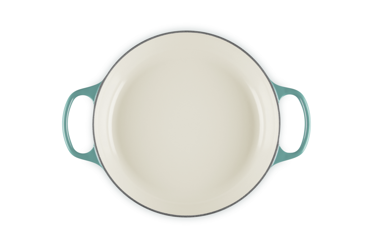 Le Creuset 30cm shallow casserole in Blue Riviera, top view showing cream interior and two handles
