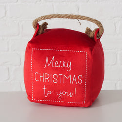 Red Christmas door stop with “Merry Christmas” text, sand-filled, rope handle, festive décor – Keans Claremorris