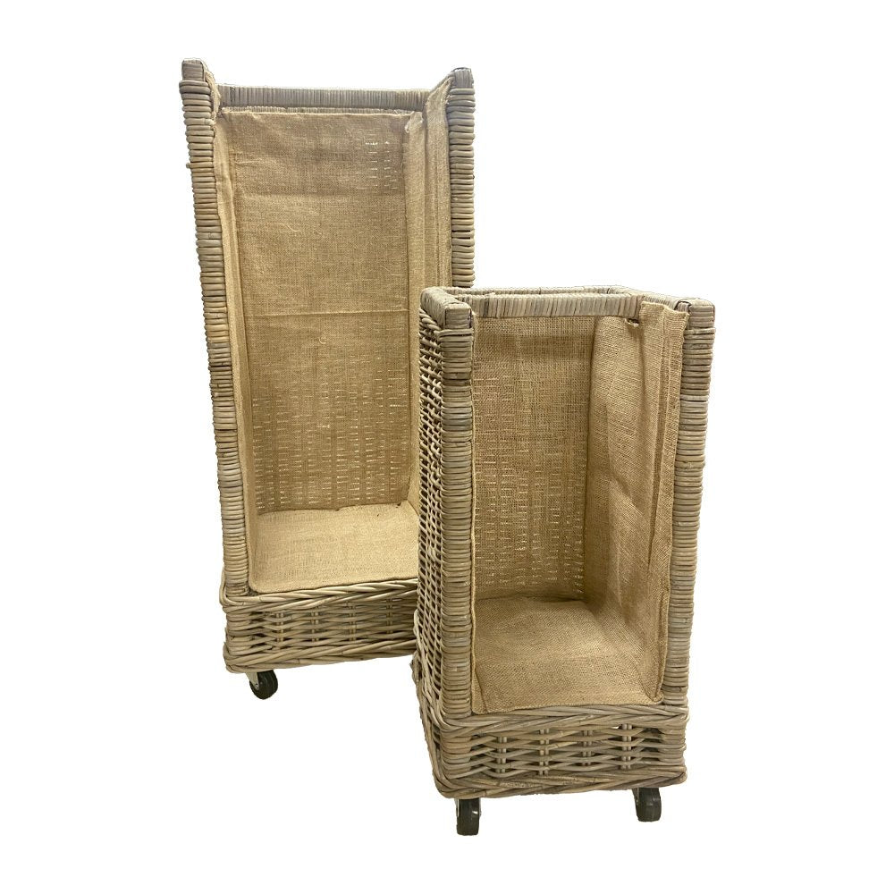 Two large Kubu wicker log baskets with natural fabric lining and wheels, shown empty on white background.