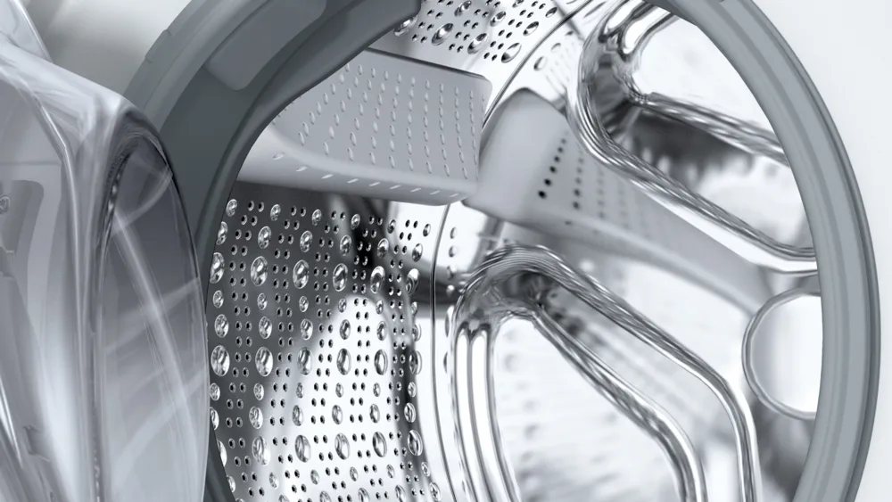 Close-up of the stainless steel drum inside the Bosch Series 8 10kg front load washing machine.