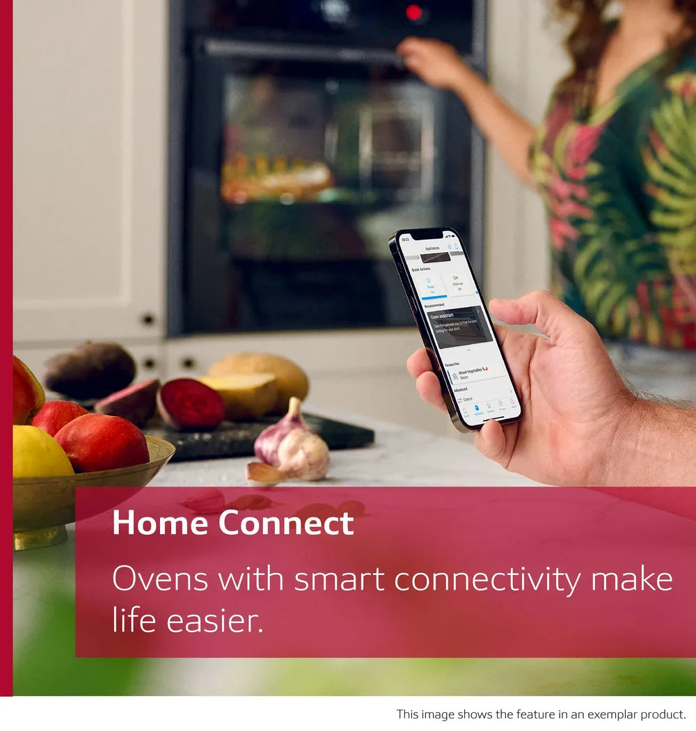 NEFF N70 Slide&Hide oven in kitchen with person controlling it via smartphone app for smart connectivity.