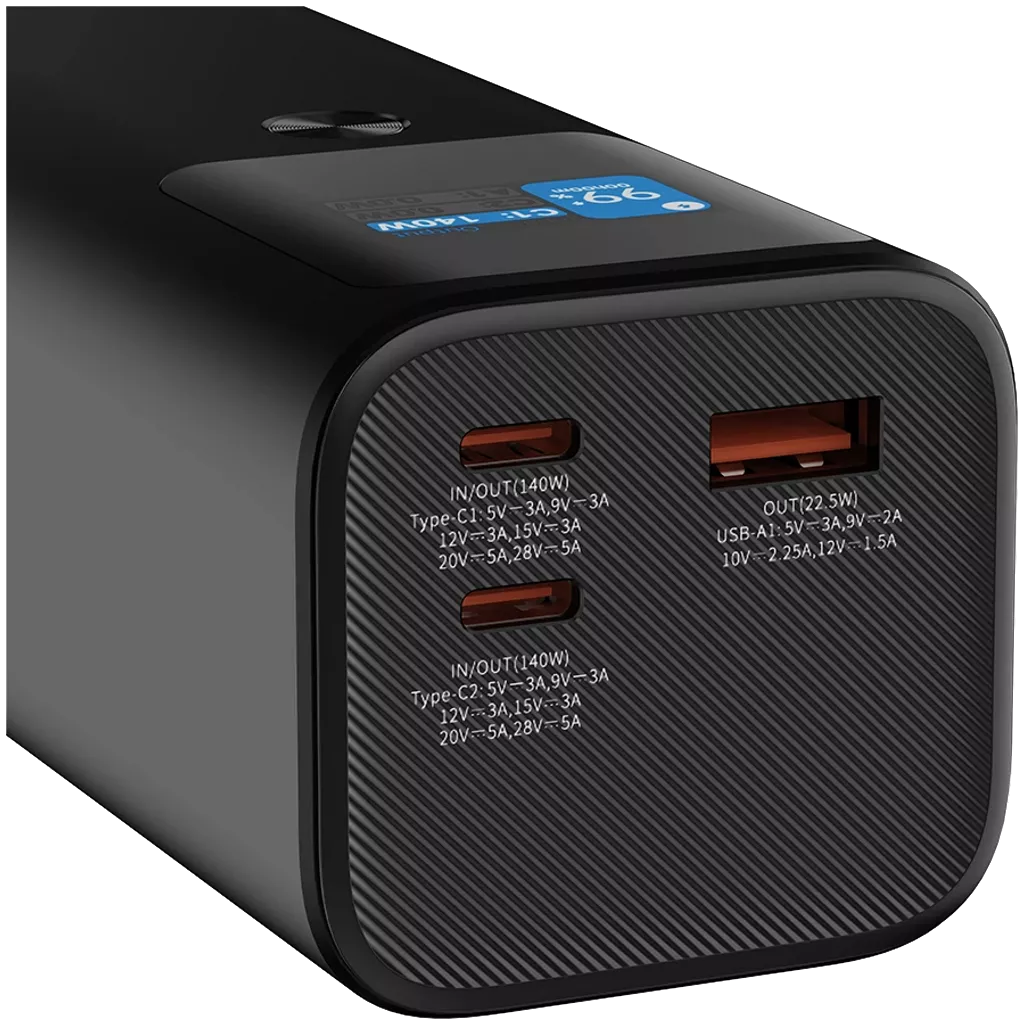 Close-up of Canyon Power bank PB-2010 showing two USB-C and one USB-A charging ports on textured black surface.