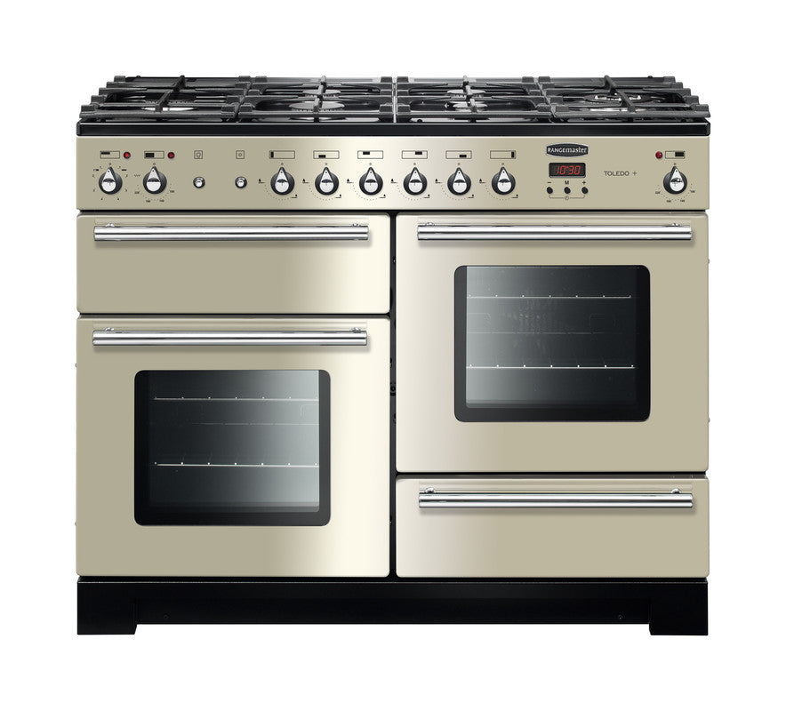 Rangemaster Toledo + 110 dual fuel cooker in cream with six burners and three oven compartments