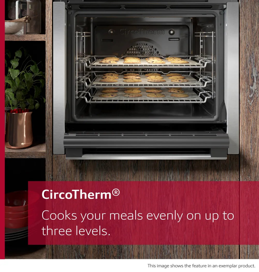 Neff 50 built-in double oven with three racks baking cookies evenly using CircoTherm technology.