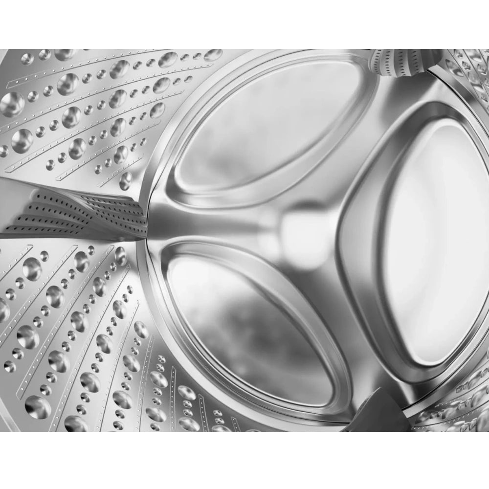 Close-up of the stainless steel drum interior of the Hisense 5S Series 12 kg washing machine.