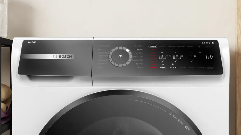 Close-up of Bosch Series 8 front loader washing machine control panel with digital display and dial.