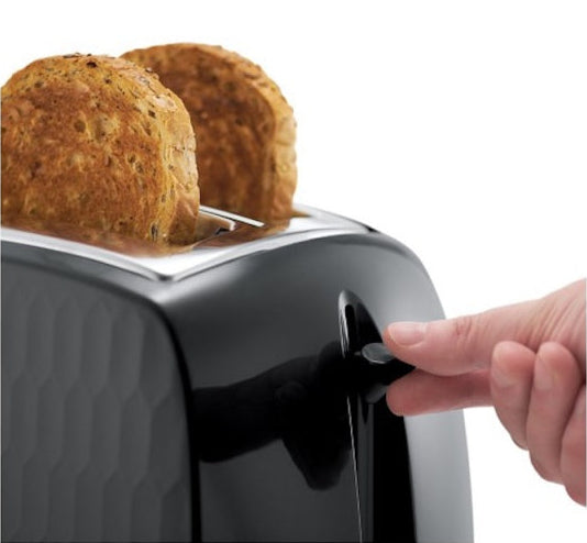 Black Russell Honeycomb Hobbs toaster with two seeded bread slices and hand pressing the lever