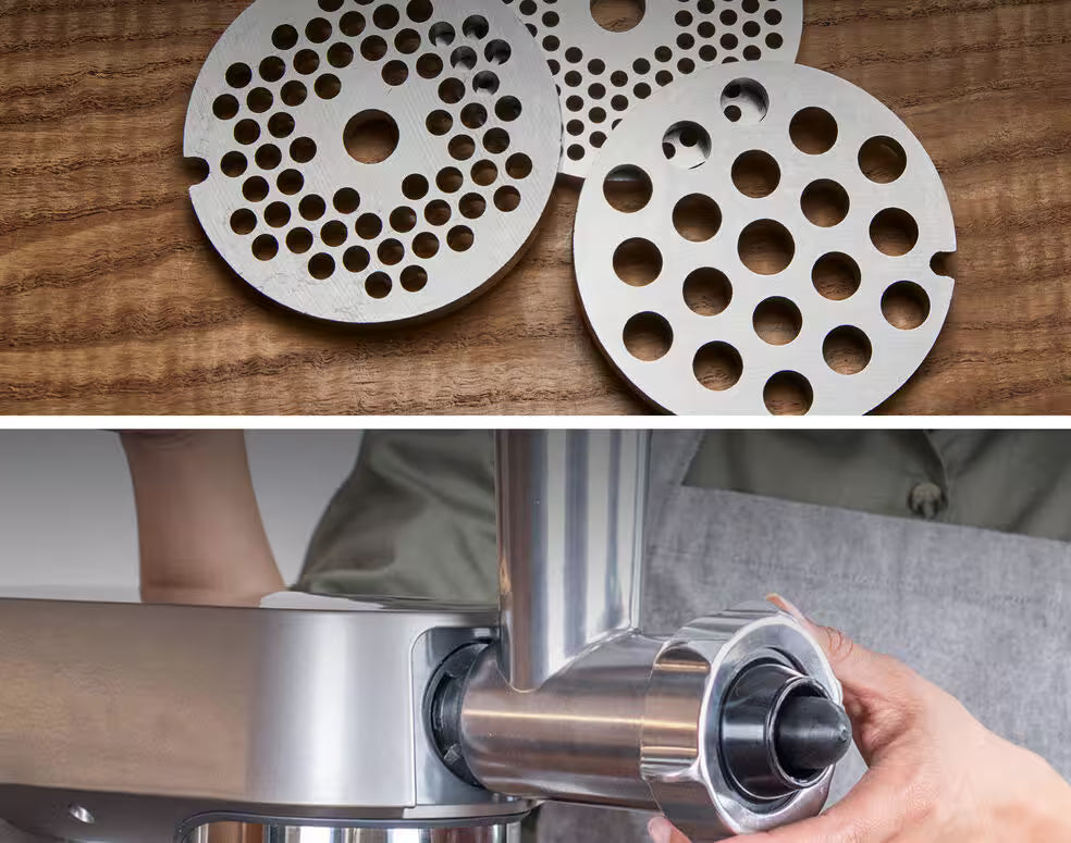 Three stainless steel grinding plates with different hole sizes for Kenwood Meat Grinder Attachment on wooden surface