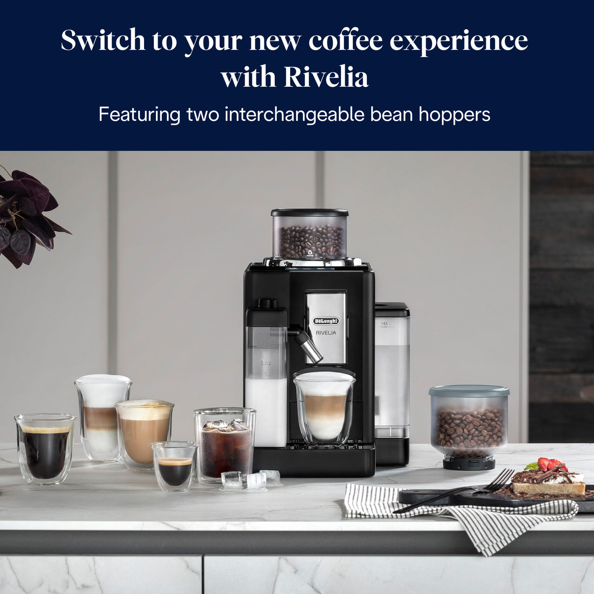 DeLonghi Rivelia black coffee machine with milk frother, bean hopper, and various coffee drinks on counter