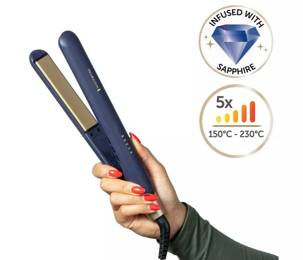 Hand holding Remington Sapphire Hair Straightener with gold plates and temperature settings visible.